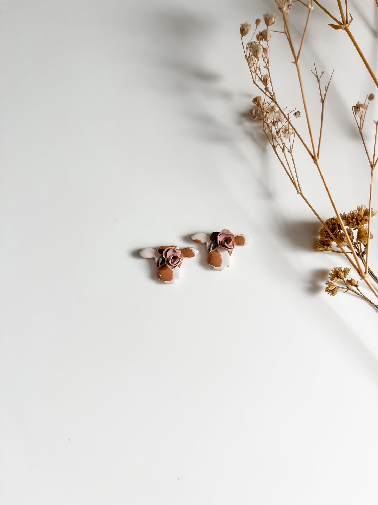 Floral Cow Studs